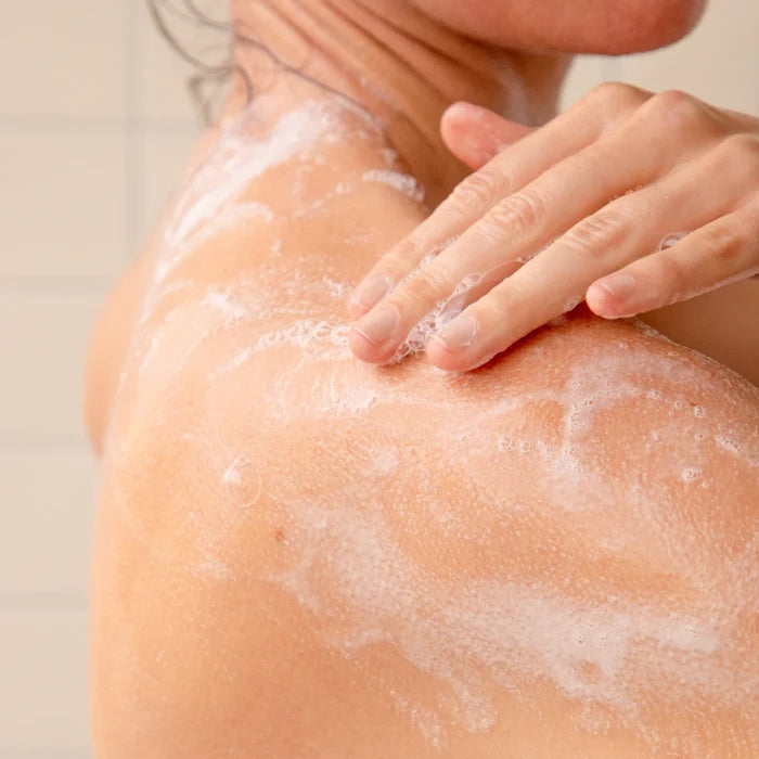 Applying 100% Pure Natural Foaming & Hydrating Body Wash