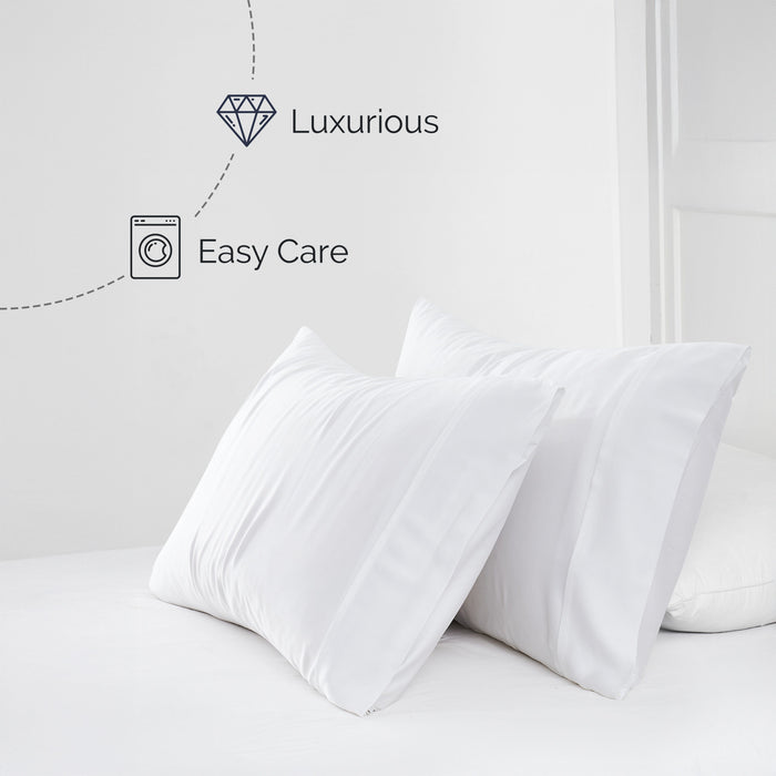 Front view of 500-thread-count Tencel Lyocell sheet set with two white pillowcases and overlaid text Luxurious and Easy Care