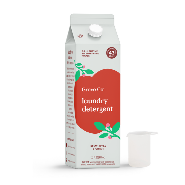 Grove Co. Laundry Detergent – 5-in-1 Enzyme Stain Fighting Power in Dewy Apple & Citrus comes in a 32 fl oz carton with a new leaf design, cleans up to 43 loads, and includes a clear measuring cup.
