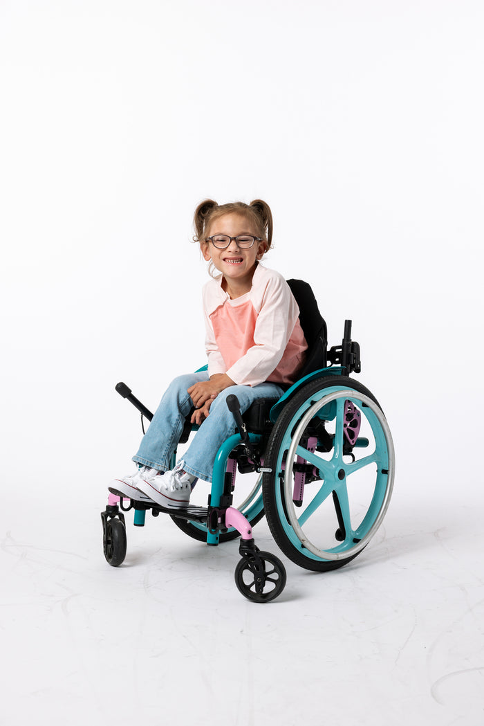 Gracie wearing Sherbet CB Kids Raglan Access Tee in wheelchair